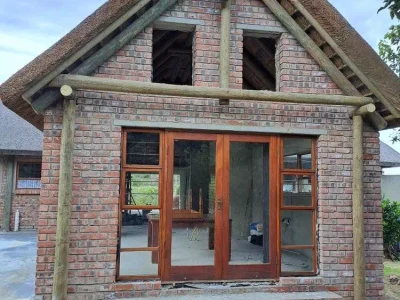 Brandwacht - Extensions and alterations to existing lawn roof house, thatch roofing